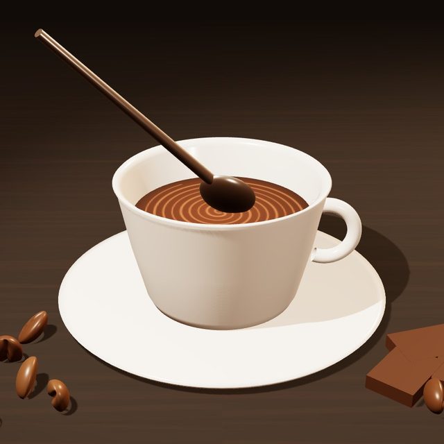 A spoon stirring the coffee